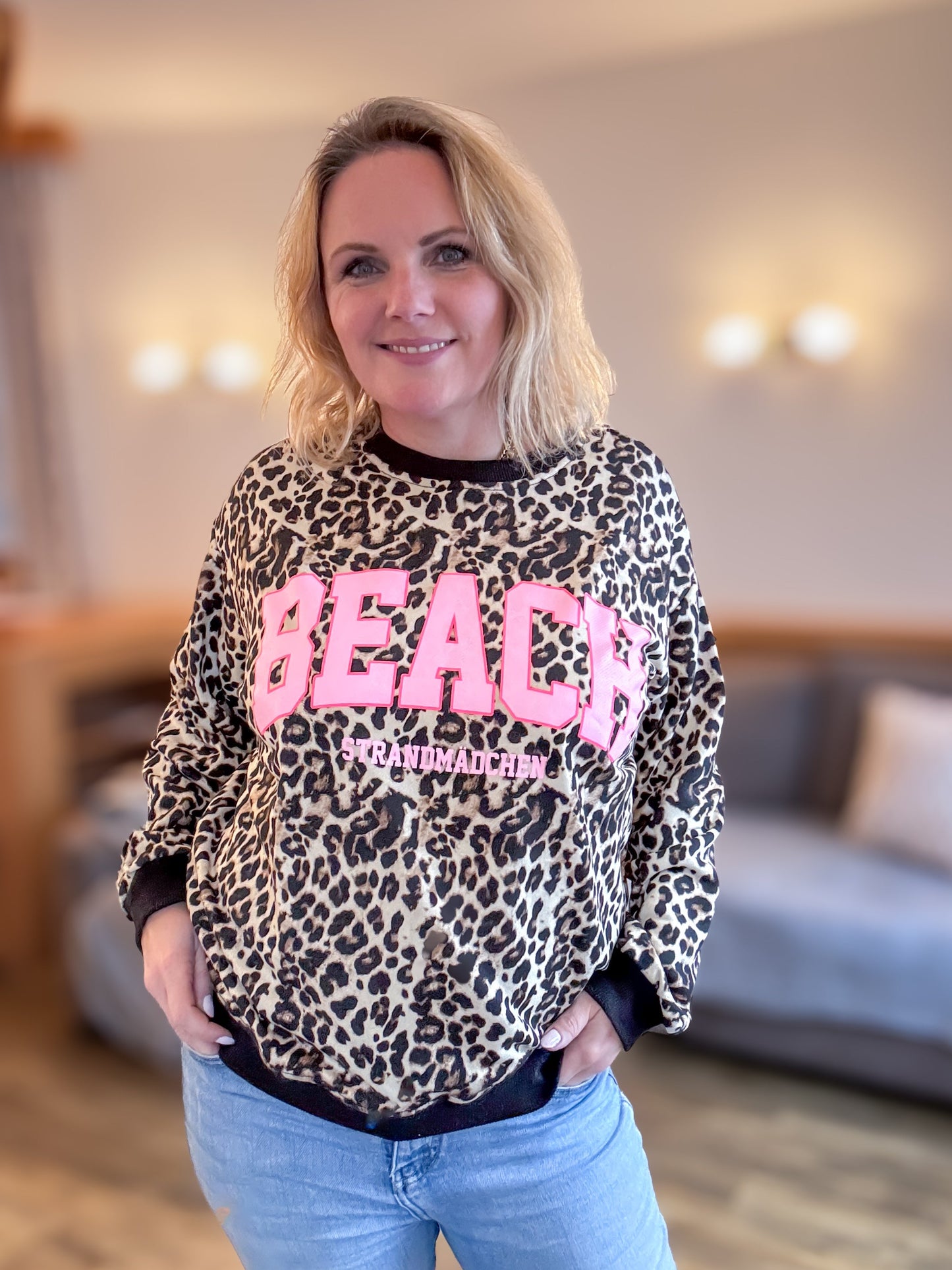 Leo Sweater mit Strandmädchen Druck